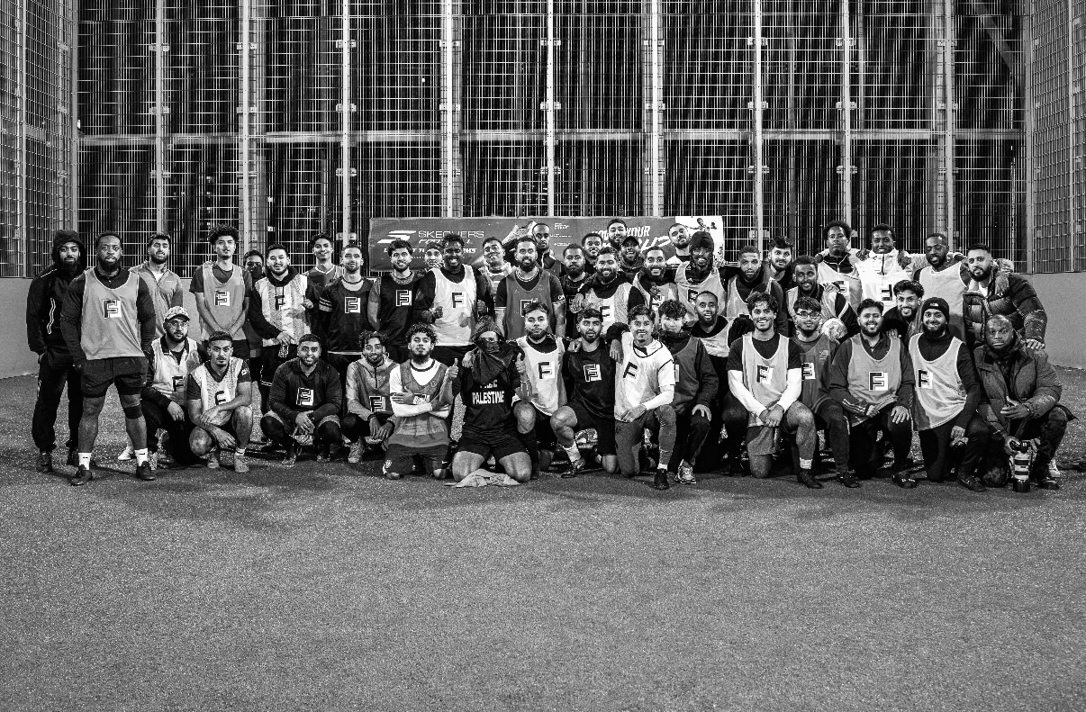Forward Fitness community running together during a group session